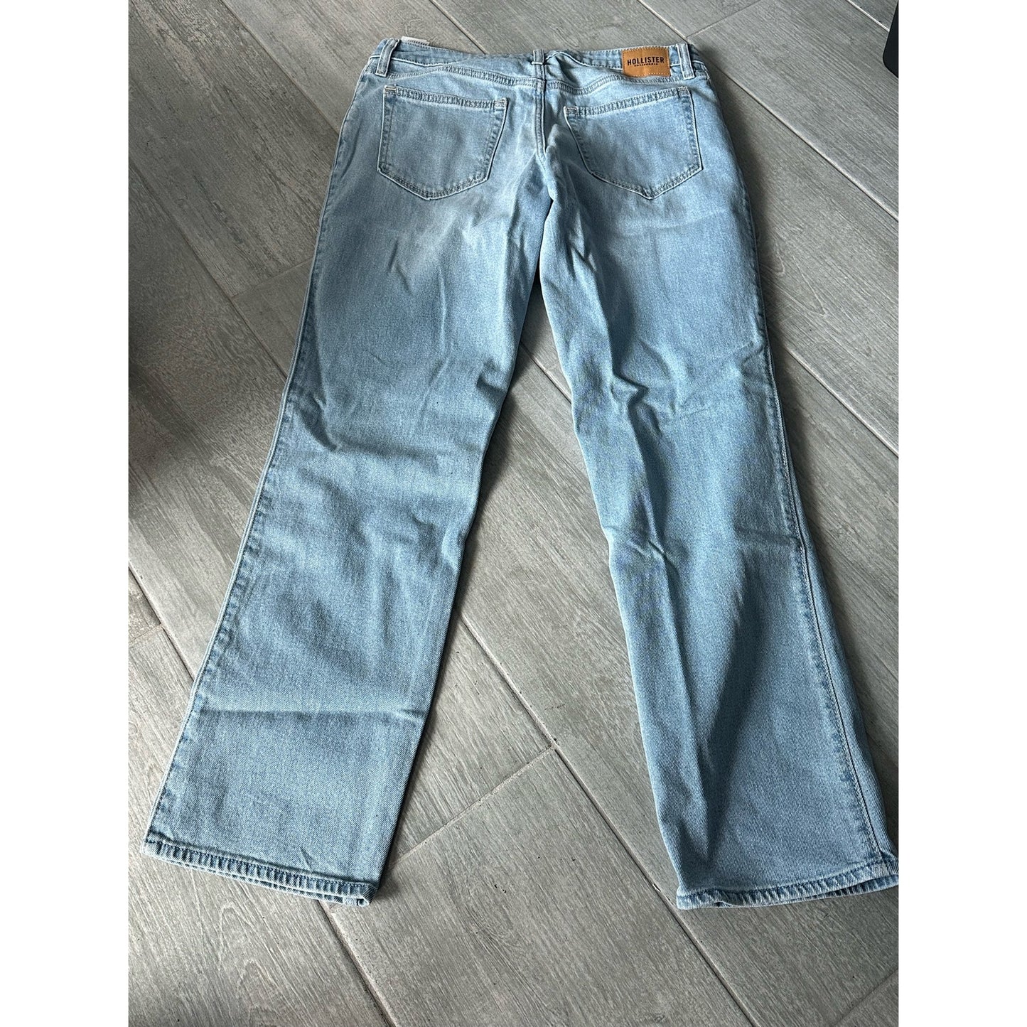 Size 9R Hollister jeans. Light denim with dark blue patches, with rips. 29W 31L