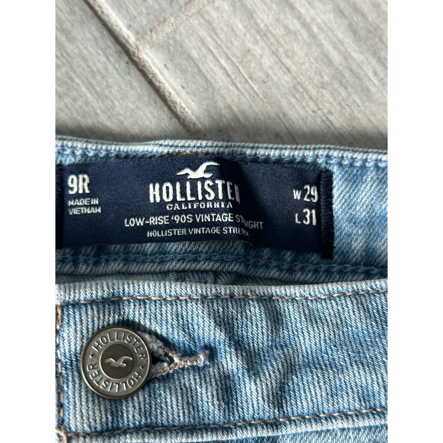 Size 9R Hollister jeans. Light denim with dark blue patches, with rips. 29W 31L