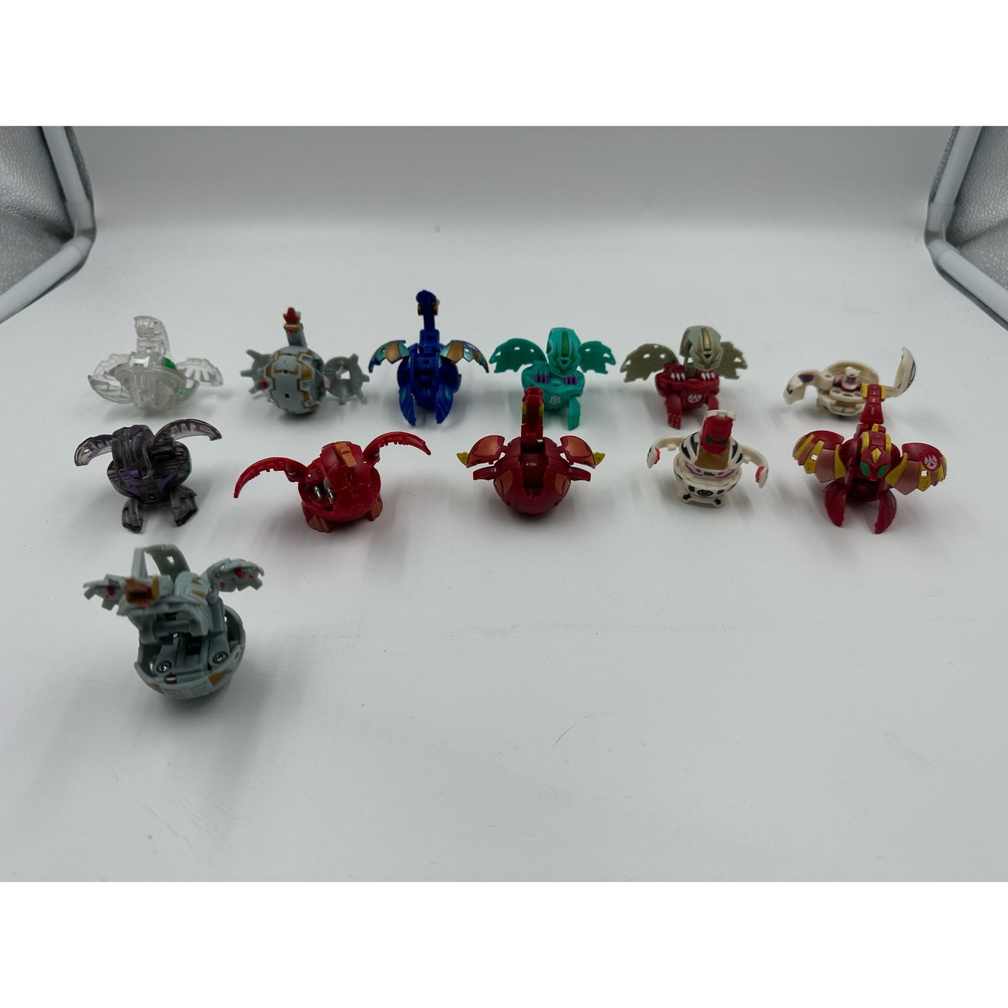 Vintage 12 Bakugan for the 1990’s with case