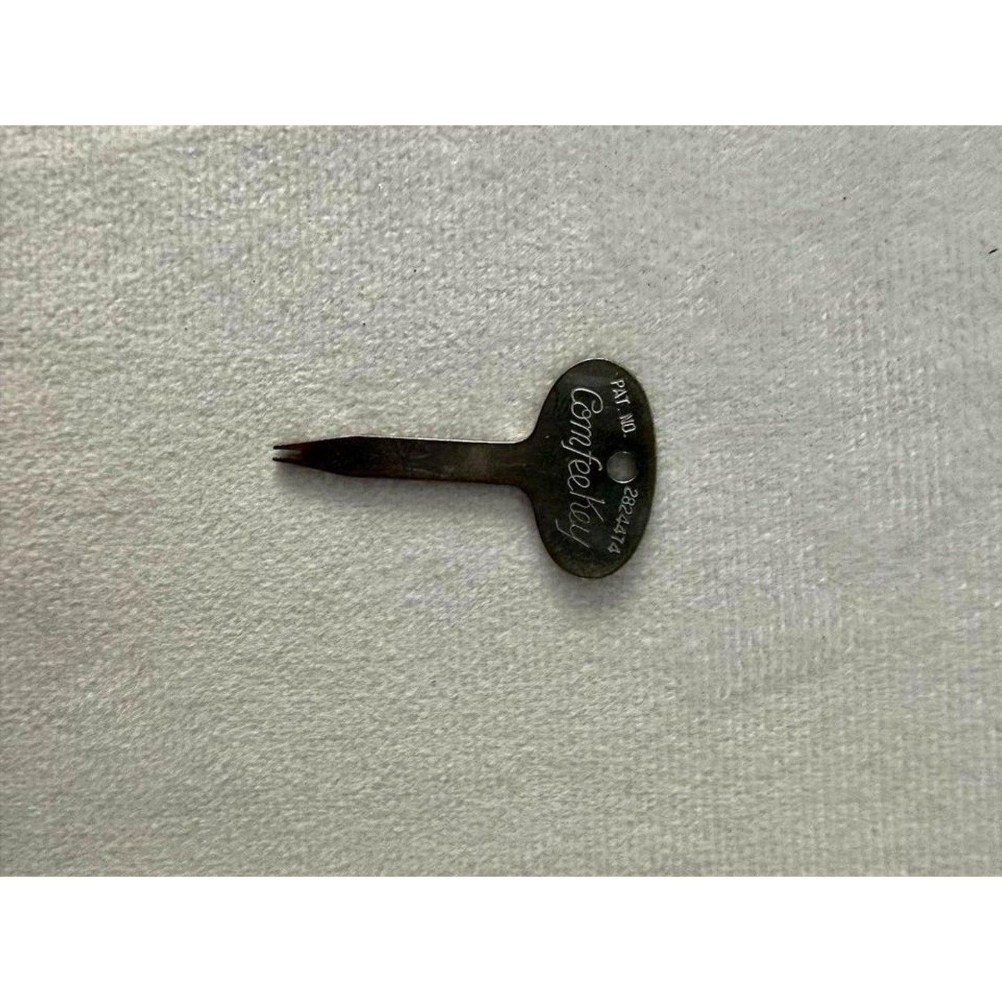 Vintage Comfee Key Pat. No. 2824474 clip on earring adjustment tool