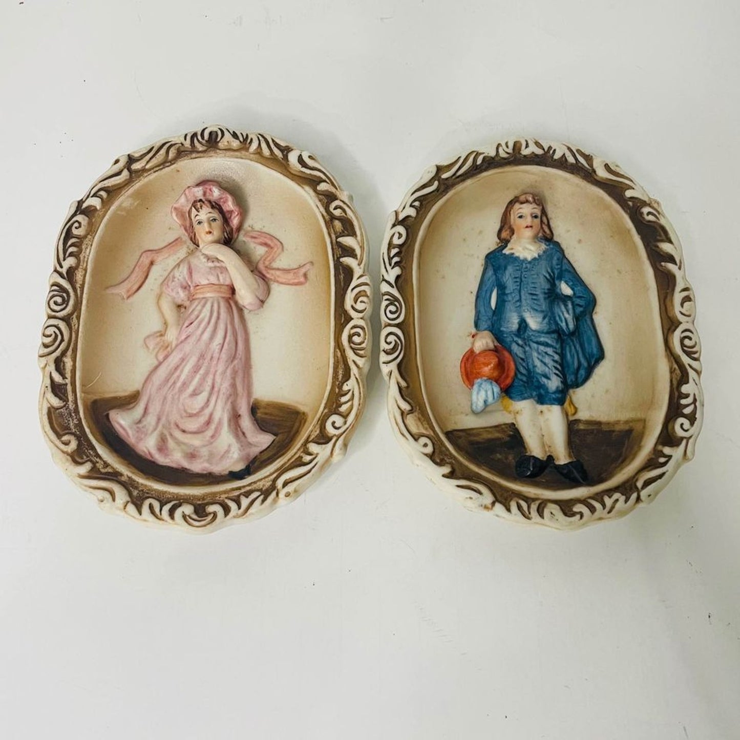 Vintage Lefton China Blue Boy and Pinkie ceramic wall art.